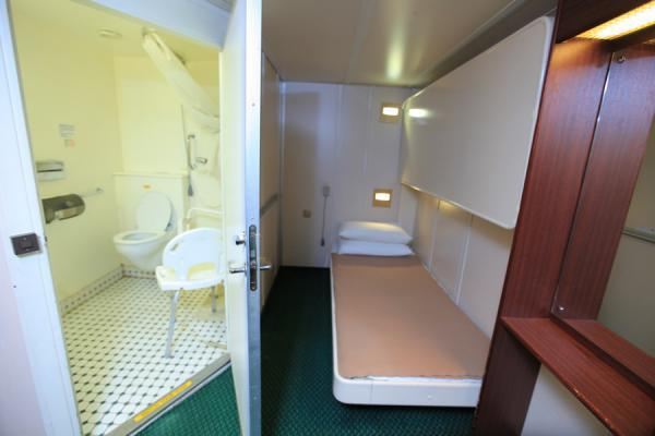 Special needs cabin equipped with special chairs and alarm bell for assistance