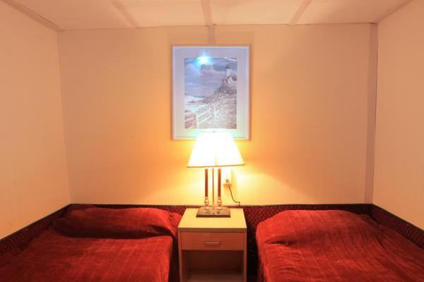 2 bunk Mini suite with sitting area, mini bar & attached toilet 2 bunk Mini suite with sitting area, mini bar & attached toilet